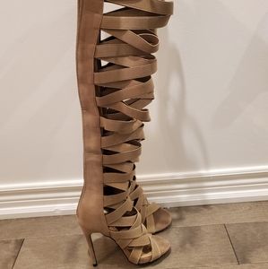 Thigh high gladiator sandals